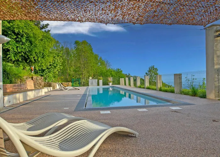Photo de Peponi Classé 4 étoiles - Piscine - Parc des Monts d'Ardèche Gourdon 
