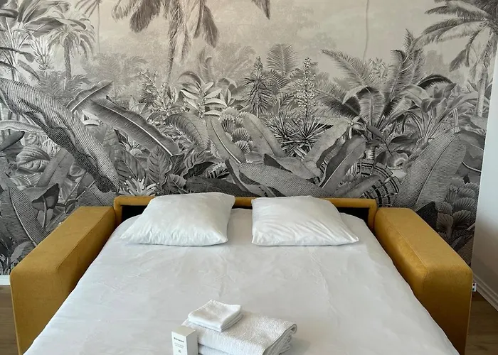 Фото Appartement Calme Avec Parking Gratuit, Acces Lyon Rapide Калюир-Э-Кюир